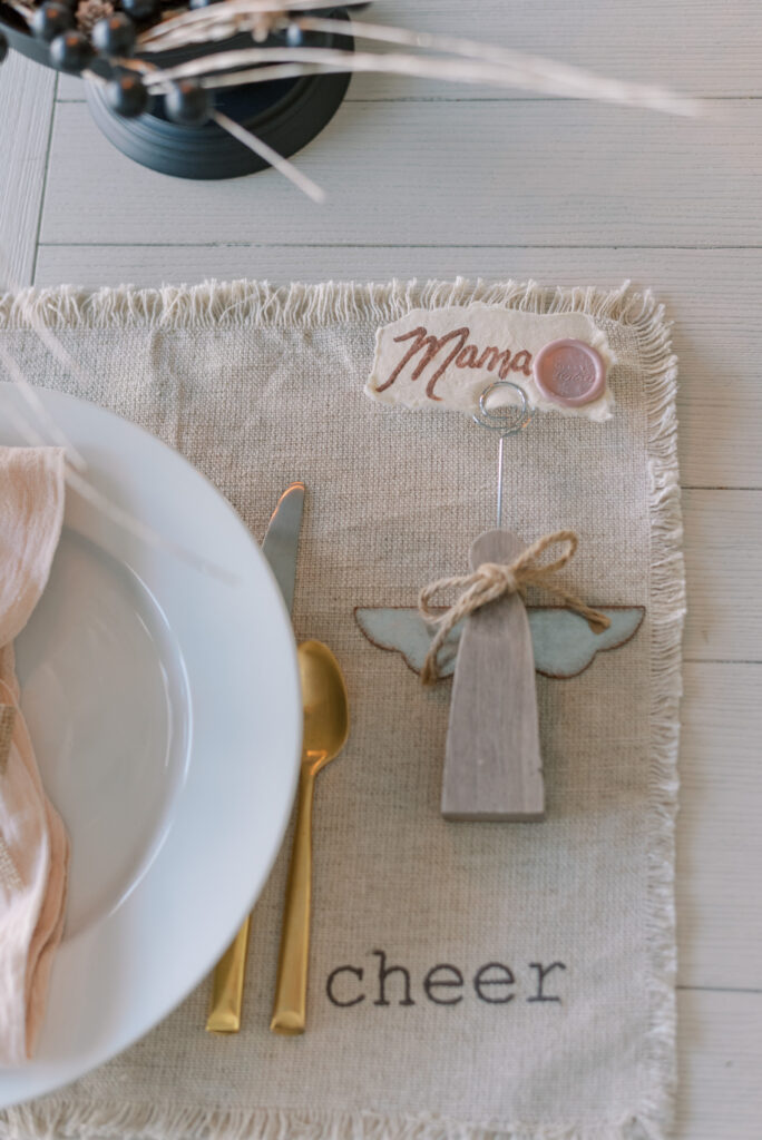 angel placecard holder with mama place card and blush wax seal
