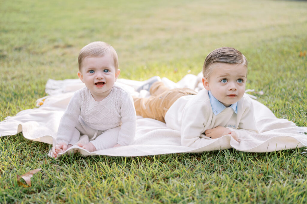two toddlers on a blanket in-home session in Charleston