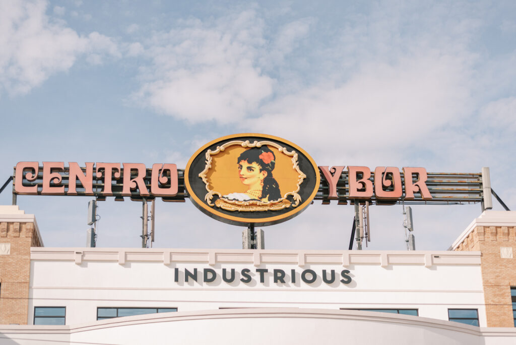 The sky and Centro Ybor sign photographed by Kelsey Halm Photography