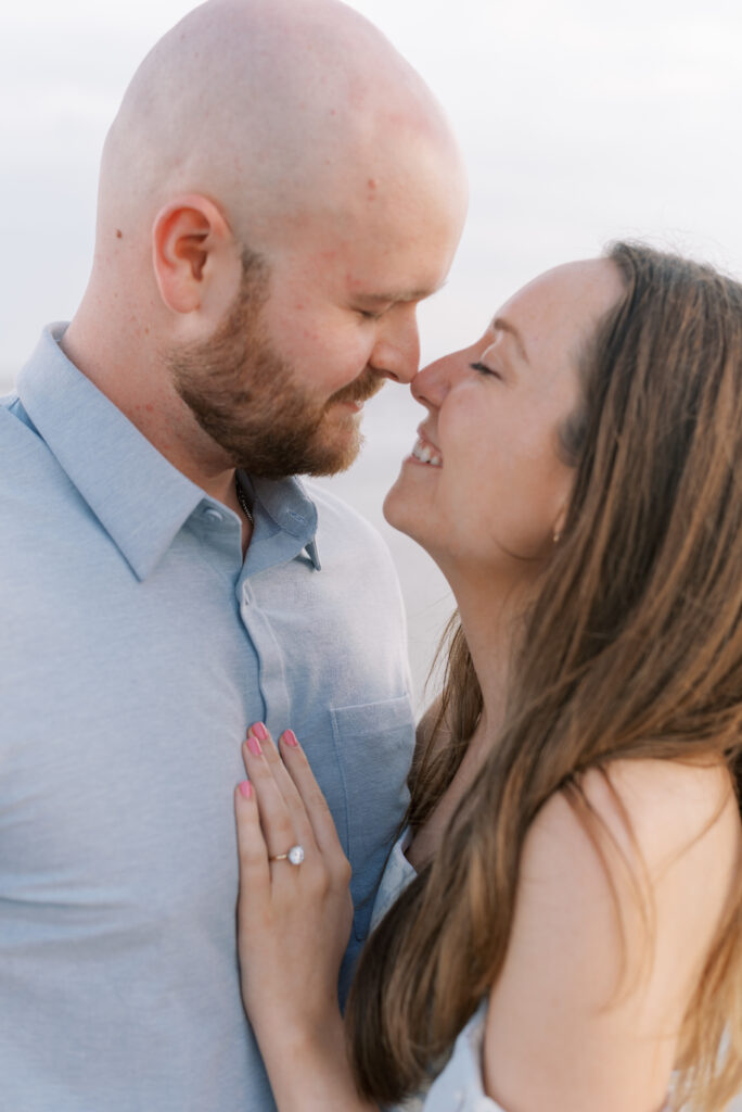 close up of an engaged couple nose to nose during their engagement photo session