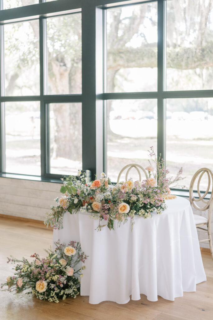 Sweetheart table with pastel florals at Middleton Place