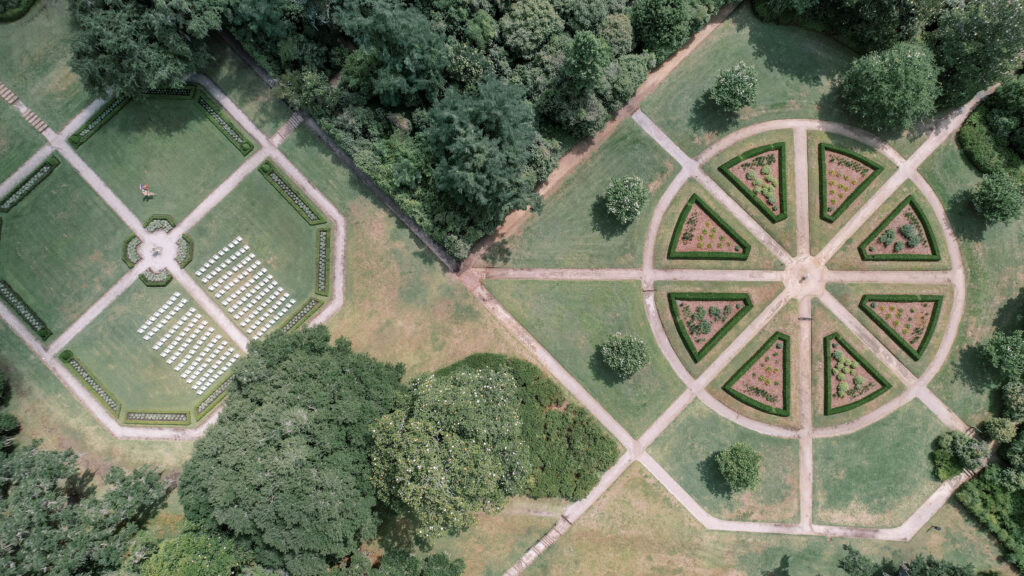 Overhead photo of the formal gardens at Middleton Place with a wedding ceremony setup