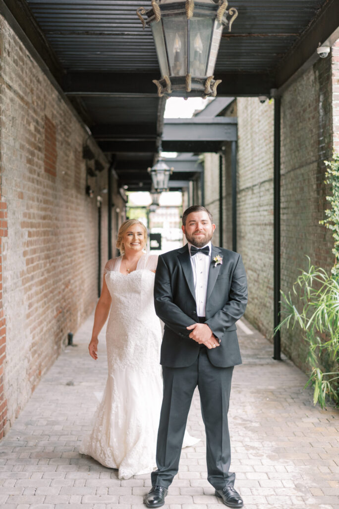 Bride and groom share a first look in downtown Charleston