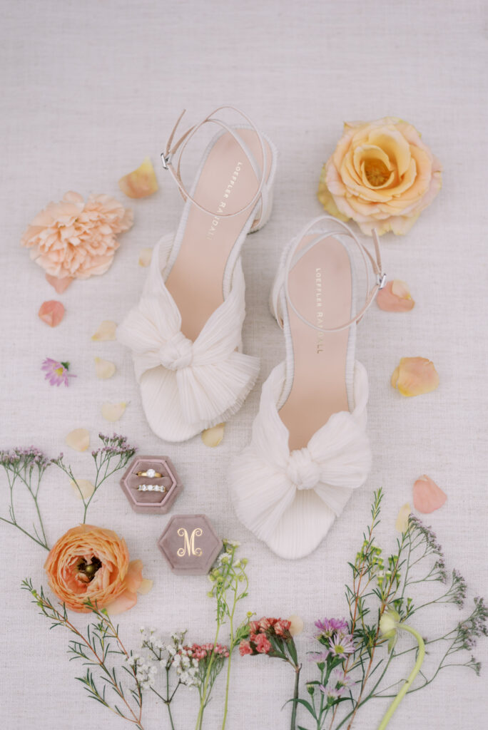 Wedding day details loeffler randall shoes, flowers, a purple ring box and gold rings