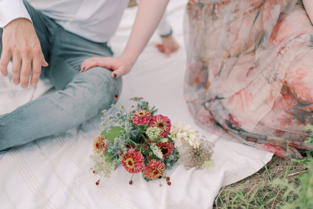 bespoke engagement session bouquet on a picnic blanket