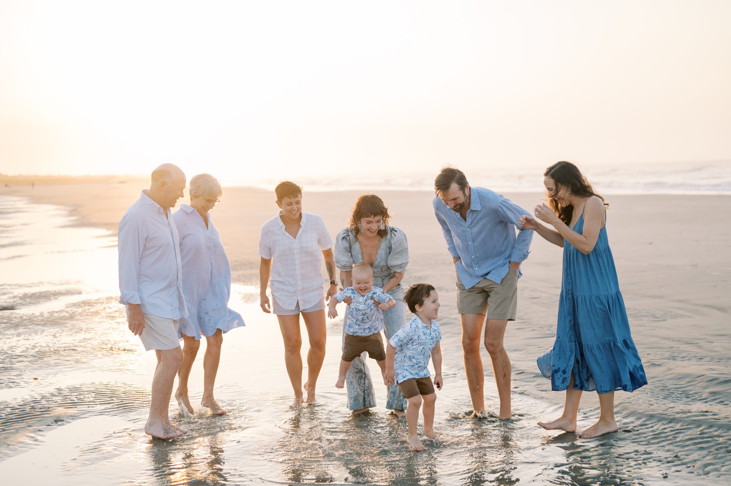 Toddlers running on Isle of Palms beach at sunrise