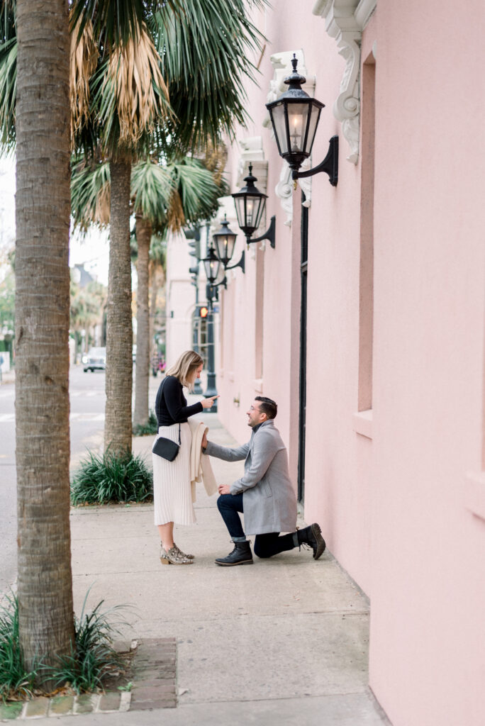 Boyfriend proposing to his girlfriend at a scenic Charleston proposal location